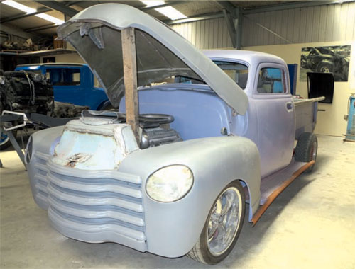 Big Shed Customs has carried out all the work on this ’48 Chev pickup. It has a HQ Holden front end, brakes and steering grafted into the stock chassis, and the running gear is all 5.0-litre Holden Commodore. It has a new floor, inner and outer skins on the back of the cab, new firewall, a 3” roof chop, new door skins and inner fenders. Headlights are Subaru Impreza. The running boards and fenders will be moulded into each other, but can still be unbolted separately.
